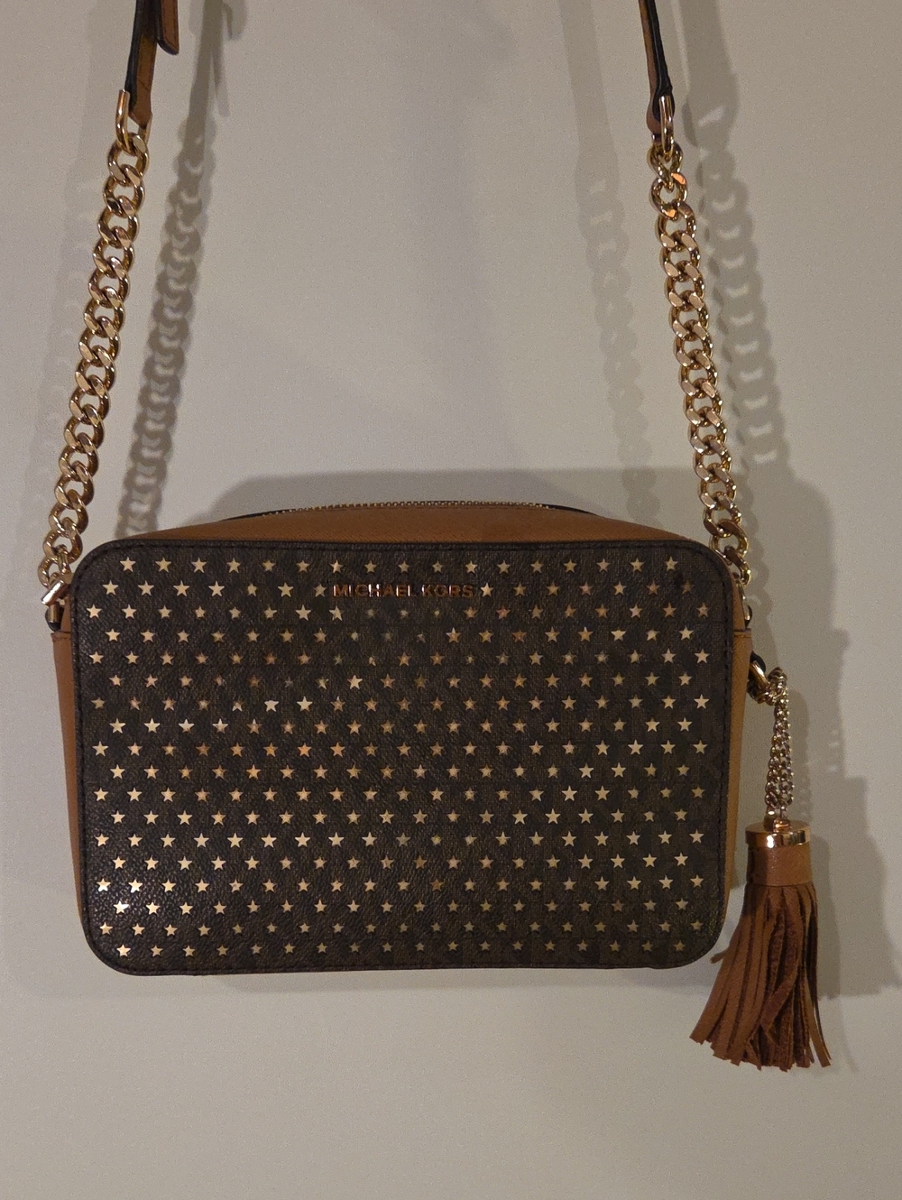 Michael Kors Brown Star-Print Crossbody with Gold Hardware and Tassel